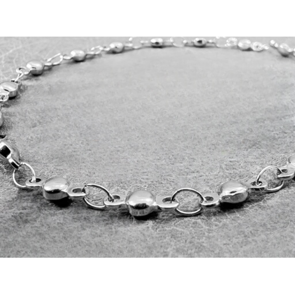 Shimmer and Shine: The Bead and Link Silver Bracelet