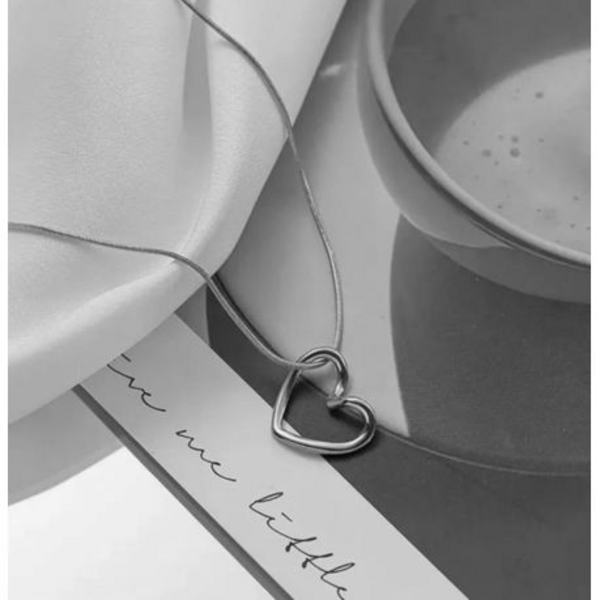 Love at First Sight: The Elegant Hollow Heart Pendant - Image 16
