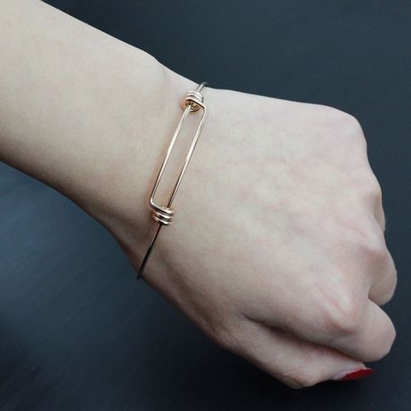 Radiate Elegance with Our Rosy Glow Stainless Steel Rose Gold Bangles