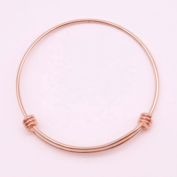 Radiate Elegance with Our Rosy Glow Stainless Steel Rose Gold Bangles