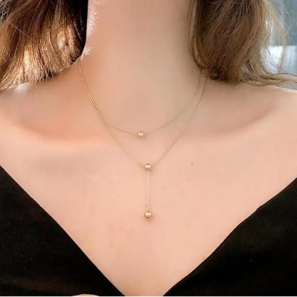Elevate Your Style: The Double-Layered Y-Necklace with Sphere Charm