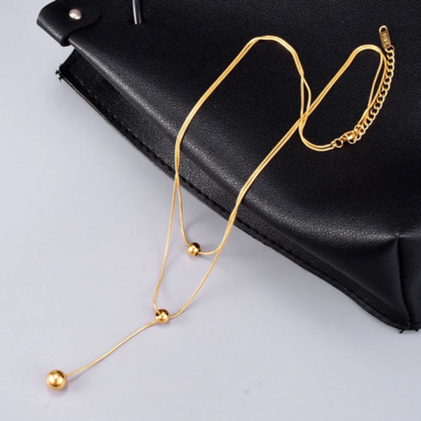 Elevate Your Style: The Double-Layered Y-Necklace with Sphere Charm