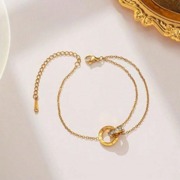 Athena Classic Interlocking Roman Numeral & Zircon Halo Bracelet in "Gold" - Image 2