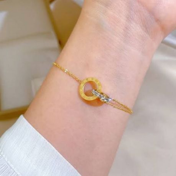 Athena Classic Interlocking Roman Numeral & Zircon Halo Bracelet in "Gold" - Image 6